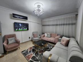 Modern Apartment in Sheraton Heliopolis, 5 minutes from Cairo Airport عمارة مطعم دجاج كنساس
